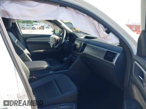 2023 Volkswagen Atlas SE with VIN 1V2WC2CA3PC228213, listed as a IAAI auction lot 42330049 with 21,884 mi miles and . Bid and sale history available at DreamBid. Image 5.
