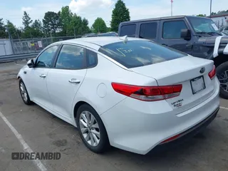 2016 Kia Optima LX with VIN 5XXGT4L34GG061718, listed as a IAAI auction lot 42176256 with 115,572 mi miles and . Bid and sale history available at carsss.com. Image 14.