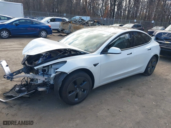 2022 Tesla Model 3 with VIN 5YJ3E1EA5NF111173, listed as a IAAI auction lot 41030634 with 99,337 mi miles. Bid and sale history available at carsss.com. Image 17.