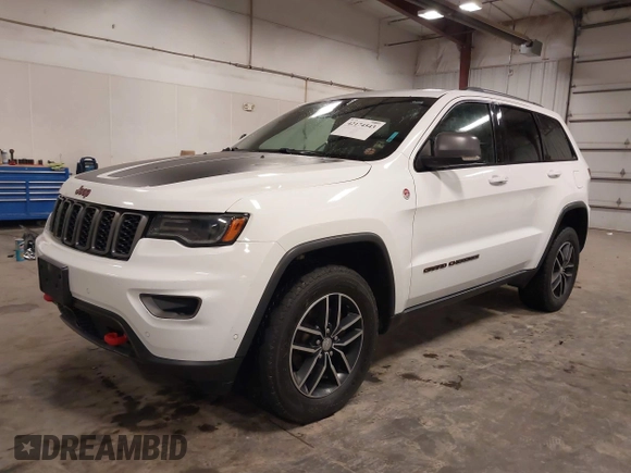 2017 Jeep Grand Cherokee Trailhawk with VIN 1C4RJFLG7HC712208, listed as a IAAI auction lot 42174543 with 158,518 mi miles and . Bid and sale history available at DreamBid. Image 2.