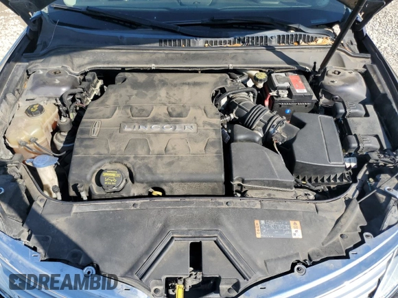 2014 Lincoln MKZ z VIN 3LN6L2JK6ER833317, wystawiony jako Copart lot #50555105 z przebiegiem 157 510 mil mil oraz Szkoda całkowita • Salvage title. Historia ofert i sprzedaży dostępna na DreamBid. Obrazek 11.