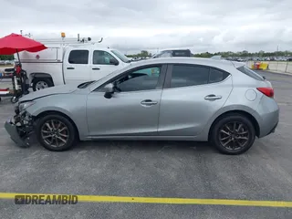 2014 Mazda 3 i Grand Touring with VIN JM1BM1M73E1216596, listed as a IAAI auction lot 41621165 with 127,235 mi miles and . Bid and sale history available at DreamBid. Image 14.