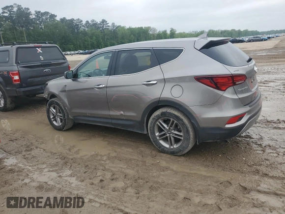 2017 Hyundai Santa Fe 2.4L z VIN 5NMZT3LBXHH038022, wystawiony jako Copart lot #51060545 z przebiegiem 63 790 mil mil oraz Szkoda całkowita • Salvage title. Historia ofert i sprzedaży dostępna na DreamBid. Obrazek 2.