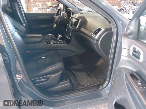 2017 Jeep Grand Cherokee Laredo with VIN 1C4RJFAG2HC786171, listed as a IAAI auction lot 40746519 with 166,136 mi miles. Bid and sale history available at carsss.com. Image 5.