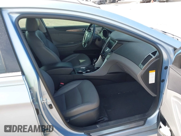 2012 Hyundai Sonata Hybrid with VIN KMHEC4A46CA059778, listed as a IAAI auction lot 41973287 with 118,625 mi miles and . Bid and sale history available at DreamBid. Image 5.