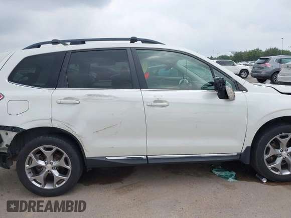 2016 Subaru Forester Touring z VIN JF2SJAVC2GH465083, wystawiony jako IAAI lot #42287323 z przebiegiem Nie podano mil oraz . Historia ofert i sprzedaży dostępna na DreamBid. Obrazek 13.