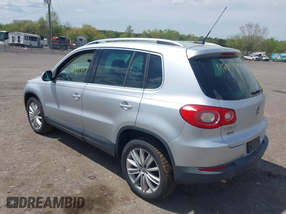 2011 Volkswagen Tiguan SE with VIN WVGBV7AX4BW532488, listed as a IAAI auction lot 42084347 with 107,529 mi miles and . Bid and sale history available at DreamBid. Image 3.