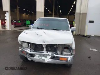 1997 Nissan Frontier XE with VIN 1N6SD16S1VC351353, listed as a IAAI auction lot 41623370 with 198,230 mi miles and . Bid and sale history available at DreamBid. Image 12.