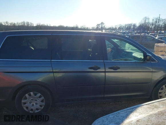 2010 Honda Odyssey LX with VIN 5FNRL3H28AB026712, listed as a IAAI auction lot 41281625 with 223,905 mi miles. Bid and sale history available at carsss.com. Image 13.