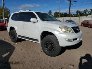 2004 Lexus GX 470 with VIN JTJBT20X440055224, listed as a Copart auction lot 75511534 with 87,324 mi miles and Salvage Title. Bid and sale history available at carsss.com. Image 4.