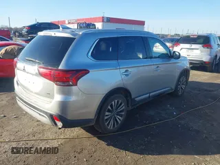 2020 Mitsubishi Outlander ES with VIN JA4AZ3A32LZ018238, listed as a IAAI auction lot 41129342 with 142,946 mi miles and . Bid and sale history available at DreamBid. Image 4.