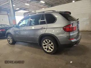 2012 BMW X5 35i z VIN 5UXZV4C58CL758466, wystawiony jako Copart lot #59799955 z przebiegiem 119 331 mil mil oraz Nie do naprawy • Non repairable. Historia ofert i sprzedaży dostępna na DreamBid. Obrazek 2.