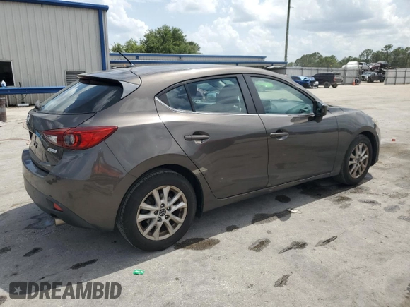 2014 Mazda 3 i Touring with VIN JM1BM1L71E1181056, listed as a Copart auction lot 59767705 with 129,447 mi miles and Salvage title. Bid and sale history available at DreamBid. Image 3.