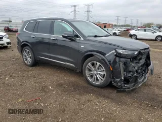 2022 Cadillac XT6 Premium Luxury z VIN 1GYKPFRS9NZ103281, wystawiony jako Copart lot #55118485 z przebiegiem 52 413 mil mil oraz Szkoda całkowita • Salvage title. Historia ofert i sprzedaży dostępna na DreamBid. Obrazek 4.