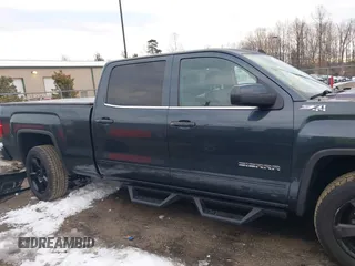 2017 GMC Sierra 1500 SLE with VIN 3GTU2MEC6HG319366, listed as a IAAI auction lot 41351311 with 123,097 mi miles and . Bid and sale history available at DreamBid. Image 13.