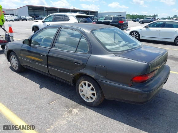 1996 Geo Prizm LSi with VIN 1Y1SK526XTZ026795, listed as a IAAI auction lot 42008701 with 178,017 mi miles. Bid and sale history available at carsss.com. Image 3.