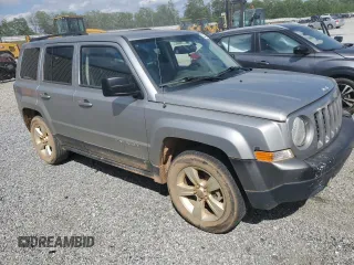 2015 Jeep Patriot Sport with VIN 1C4NJRBB1FD176983, listed as a Copart auction lot 55927735 with 166,717 mi miles and Salvage title. Bid and sale history available at DreamBid. Image 4.