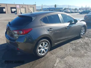 2015 Mazda 3 i Sport with VIN 3MZBM1K72FM229649, listed as a IAAI auction lot 41346541 with 155,940 mi miles and . Bid and sale history available at DreamBid. Image 4.