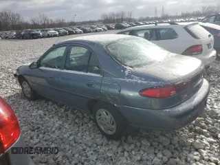1999 Ford Escort LX with VIN 1FAFP10P6XW211371, listed as a Copart auction lot 82523444 with 122,534 mi miles and Salvage Title. Bid and sale history available at carsss.com. Image 2.
