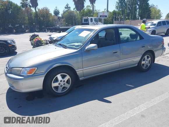 2001 Toyota Camry CE with VIN JT2BG22K810539653, listed as a IAAI auction lot 42236078 with 241,250 mi miles and . Bid and sale history available at DreamBid. Image 2.