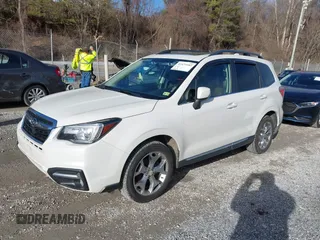 2017 Subaru Forester Touring with VIN JF2SJAWC0HH550052, listed as a IAAI auction lot 41475102 with 115,600 mi miles and . Bid and sale history available at DreamBid. Image 19.