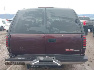 1997 GMC Yukon with VIN 1GKEK13R0VJ755574, listed as a IAAI auction lot 41158932 with 212,668 mi miles. Bid and sale history available at carsss.com. Image 17.