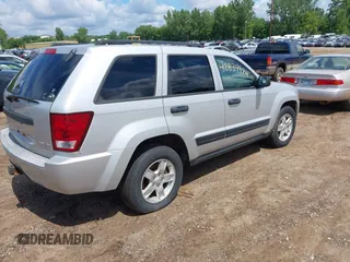 2005 Jeep Grand Cherokee Laredo with VIN 1J4GR48K55C573607, listed as a IAAI auction lot 42834424 with 130,275 mi miles and . Bid and sale history available at DreamBid. Image 4.