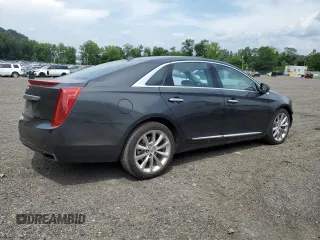 2013 Cadillac XTS Luxury with VIN 2G61R5S37D9109150, listed as a Copart auction lot 64238185 with 22,633 mi miles and Salvage title. Bid and sale history available at DreamBid. Image 3.