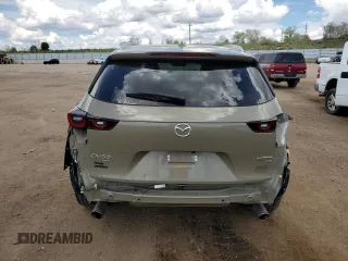 2023 Mazda CX-50 Premium z VIN 7MMVABDYXPN103342, wystawiony jako Copart lot #56426525 z przebiegiem 37 143 mil mil oraz Szkody całkowita. Historia ofert i sprzedaży dostępna na DreamBid. Obrazek 6.