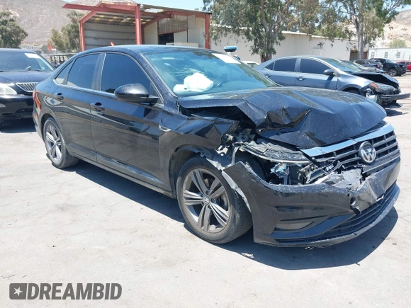 2019 Volkswagen Jetta S z VIN 3VWC57BU1KM116991, wystawiony jako IAAI lot #42377777 z przebiegiem 70 910 mil mil oraz . Historia ofert i sprzedaży dostępna na DreamBid. Obrazek 1.