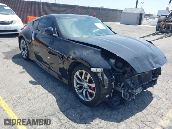 2015 Nissan 370Z Sport with VIN JN1AZ4EH3FM441836, listed as a IAAI auction lot 42094959 with 59,004 mi miles and . Bid and sale history available at DreamBid. Image 1.