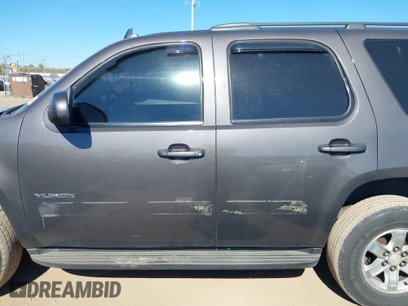 2011 GMC Yukon SLE with VIN 1GKS2AE04BR207818, listed as a IAAI auction lot 40669731 with 312,959 mi miles. Bid and sale history available at carsss.com. Image 14.