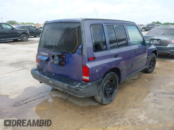1996 Geo Tracker z VIN 2CNBE1361T6901708, wystawiony jako IAAI lot #41998005 z przebiegiem 223 266 mil mil oraz . Historia ofert i sprzedaży dostępna na DreamBid. Obrazek 4.