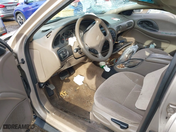 1999 Ford Taurus SE with VIN 1FAFP53U3XA131984, listed as a IAAI auction lot 41638566 with 84,836 mi miles. Bid and sale history available at carsss.com. Image 5.