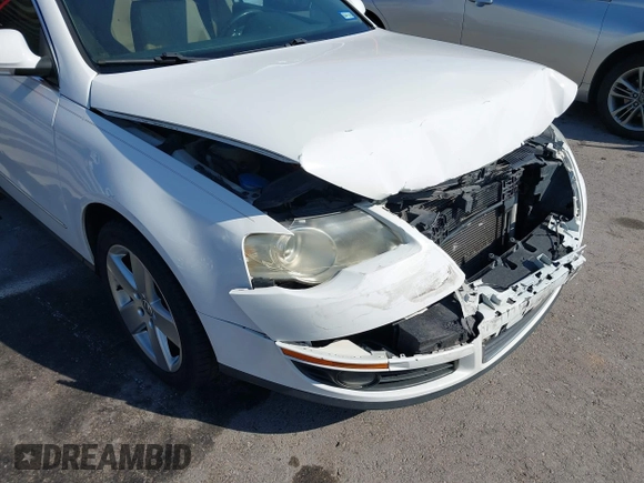 2009 Volkswagen Passat z VIN WVWJK93C29P033434, wystawiony jako IAAI lot #41698532 z przebiegiem 129 256 mil mil oraz . Historia ofert i sprzedaży dostępna na DreamBid. Obrazek 18.