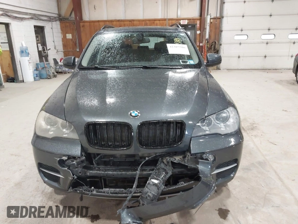 2012 BMW X5 35i z VIN 5UXZV4C59CL985715, wystawiony jako IAAI lot #42307586 z przebiegiem 105 147 mil mil oraz . Historia ofert i sprzedaży dostępna na DreamBid. Obrazek 12.