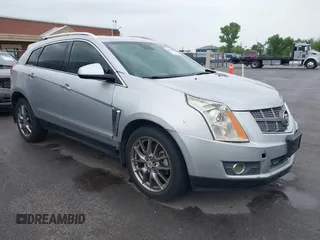 2013 Cadillac SRX Luxury Collection z VIN 3GYFNCE35DS647986, wystawiony jako IAAI lot #42372348 z przebiegiem 144 480 mil mil oraz . Historia ofert i sprzedaży dostępna na DreamBid. Obrazek 1.
