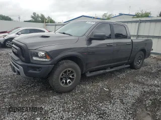 2017 Ram 1500 Rebel with VIN 1C6RR7YT5HS659090, listed as a Copart auction lot 60418075 with 122,084 mi miles and Salvage title. Bid and sale history available at DreamBid. Image 1.