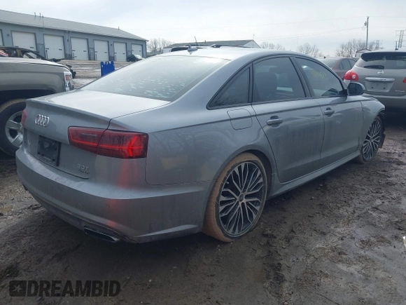 2017 Audi A6 Premium Plus z VIN WAUF2AFC7HN007745, wystawiony jako IAAI lot #41647523 z przebiegiem 119 837 mil mil oraz . Historia ofert i sprzedaży dostępna na DreamBid. Obrazek 4.