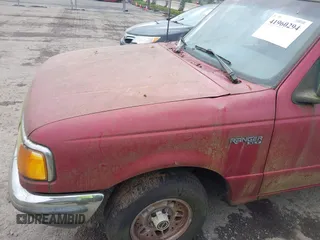 1993 Ford Ranger STX z VIN 1FTCR14X4PPB32017, wystawiony jako IAAI lot #41960294 z przebiegiem 50 331 mil mil oraz . Historia ofert i sprzedaży dostępna na DreamBid. Obrazek 6.