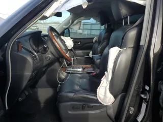 2019 Infiniti QX80 LUXE with VIN JN8AZ2NF3K9681793, listed as a Copart auction lot 49930475 with 83,923 mi miles and Salvage Title. Bid and sale history available at carsss.com. Image 7.