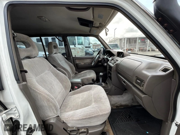 1997 Mitsubishi Montero z VIN JA4MR41R3VJ007919, wystawiony jako Copart lot #51544685 z przebiegiem 268 046 mil mil oraz Czysty tytuł • Clean title. Historia ofert i sprzedaży dostępna na DreamBid. Obrazek 5.