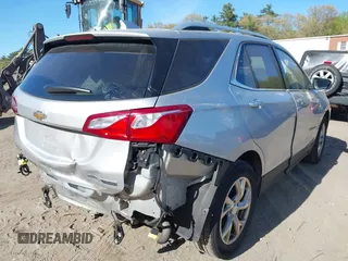 2018 Chevrolet Equinox Premier with VIN 3GNAXVEV4JS598239, listed as a IAAI auction lot 42112886 with 142,093 mi miles and . Bid and sale history available at DreamBid. Image 4.