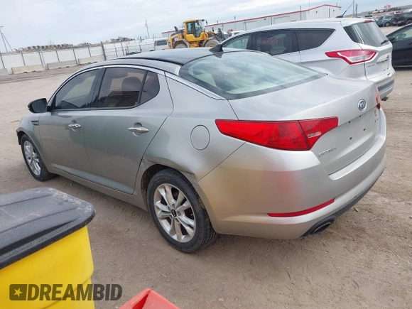 2011 Kia Optima EX with VIN KNAGN4A75B5046848, listed as a IAAI auction lot 41882138 with 81,800 mi miles and . Bid and sale history available at carsss.com. Image 3.