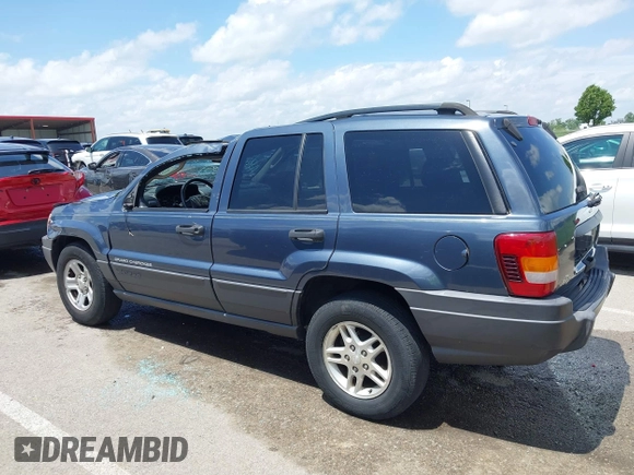 2004 Jeep Grand Cherokee Laredo with VIN 1J4GX48S44C205469, listed as a IAAI auction lot 42310571 with 154,929 mi miles and . Bid and sale history available at DreamBid. Image 14.