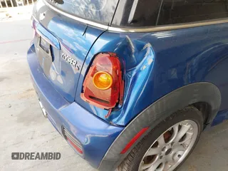 2007 MINI Hardtop S with VIN WMWMF73557TT86128, listed as a IAAI auction lot 42417311 with 114,911 mi miles and . Bid and sale history available at DreamBid. Image 6.