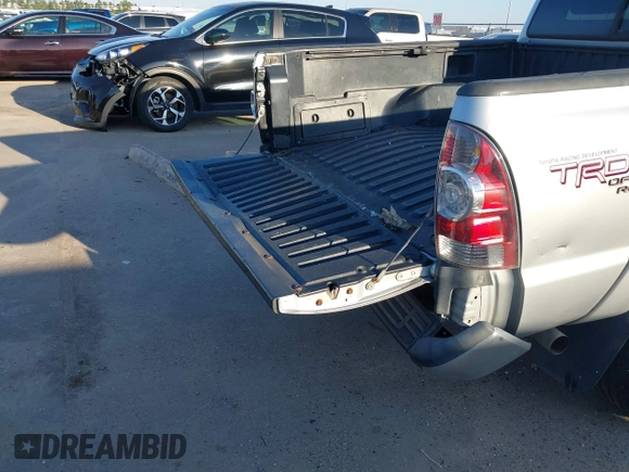 2009 Toyota Tacoma PreRunner with VIN 3TMJU62NX9M081748, listed as a IAAI auction lot 41608525 with 210,999 mi miles. Bid and sale history available at carsss.com. Image 17.