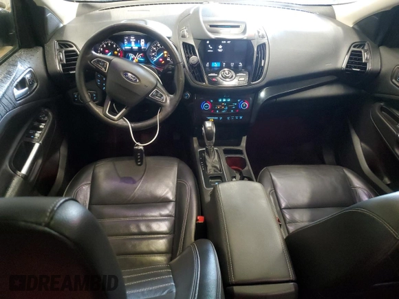 2018 Ford Escape Titanium with VIN 1FMCU9J9XJUA01357, listed as a Copart auction lot 56868735 with 67,315 mi miles and Salvage title. Bid and sale history available at DreamBid. Image 8.