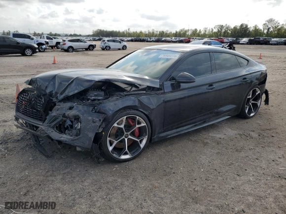 2024 Audi RS 5 Sportback with VIN WUAAWCF52RA900903, listed as a Copart auction lot 76949274 with 5,867 mi miles and Salvage Title. Bid and sale history available at carsss.com. Image 1.