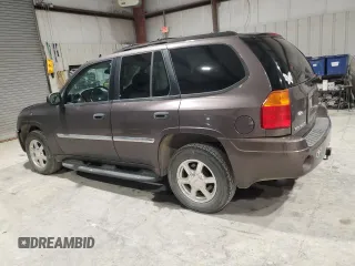 2008 GMC Envoy SLE2 with VIN 1GKDS13S482236329, listed as a Copart auction lot 87001674 with 150,807 mi miles and Salvage Title. Bid and sale history available at carsss.com. Image 2.